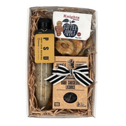 Gift set with licorice, toffee apple, and dark chocolate licorice in a box.